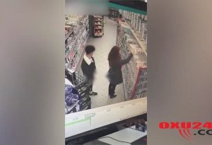 Marketdə biabırçılıq: Ərzaq alan qıza qarşı seksual hərəkətlər etdi, kameraya düşdü (VİDEO)