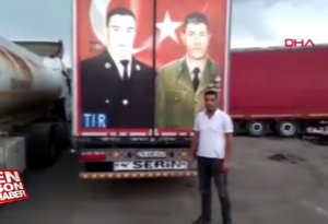 Gürcü polisi Mübarizin fotosunu sökmək istədi, dava düşdü - VİDEO