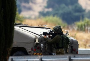 İsrail ordusu raketi atan silahlılara zərbə endirdiyini bildirib