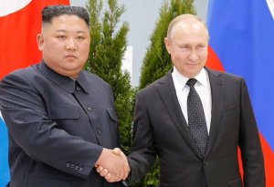 Putin ilə Kim Çen In arasında görüş başladı