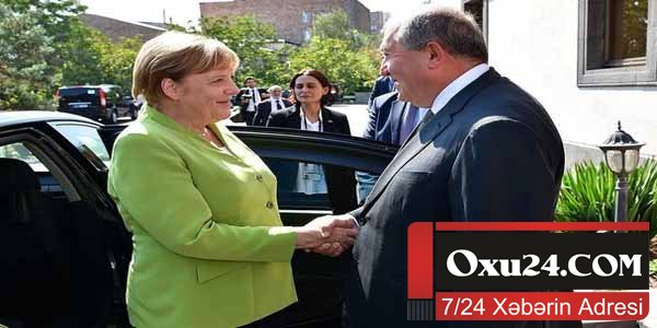 Merkelin qarşılanma mərasimində biabırçılıq - Onu gətirməyə gedən avtomobil kimindir?