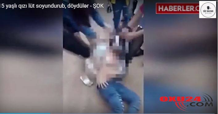 Oğlanla cinsi əlaqədə olan qızı lüt soyundurub, küçənin ortasında....+VİDEO