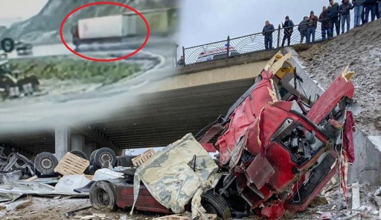 Bakıda yük maşınının körpüdən aşdığı anın görüntüsü - VİDEO