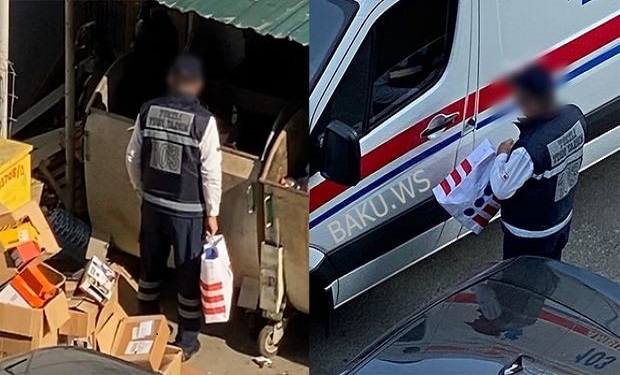 Bakıda təcili yardım maşınının sürücüsü zibil qutularını eşələyir -VİDEO
