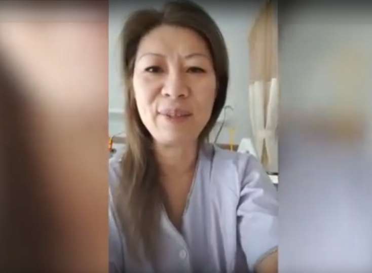 Koronovirusa yoluxan qadının videosu yayılıb