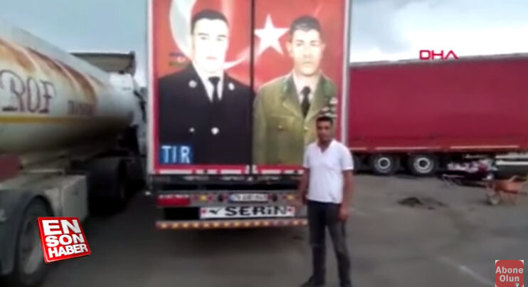 Gürcü polisi Mübarizin fotosunu sökmək istədi, dava düşdü - VİDEO