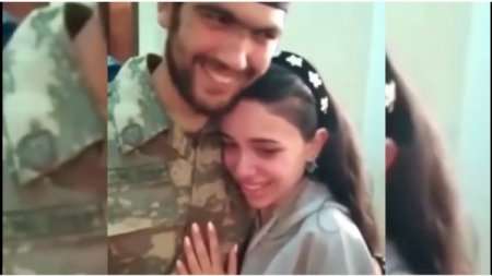 Bir qolunu itirən qazimizin döyüşdən sonra ailə üzvləri ilə ilk görüşü - Video