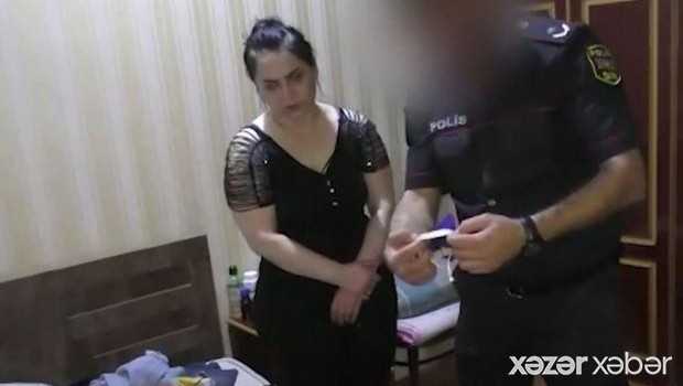 Polis qadını tutdu: Görün nə edirmiş (VİDEO)