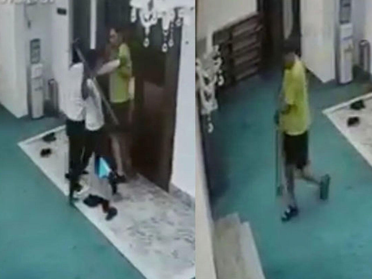 Məscidə ayaqqabı ilə girən turist deportasiya edildi - VİDEO