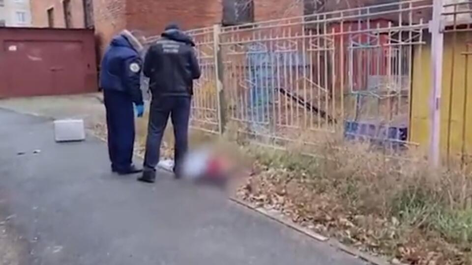 Küçədən parçalanmış qadın meyiti tapıldı (18+ görüntülər)
