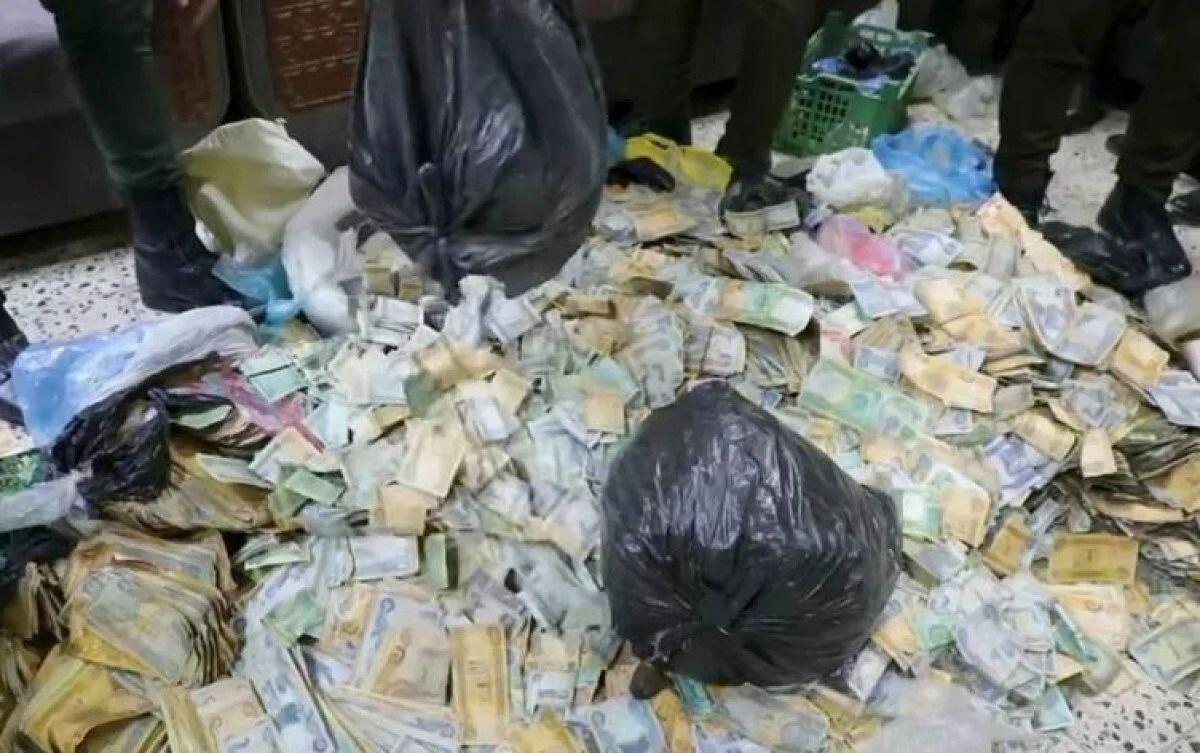Dilənçinin evindən 400 min dollar pul tapıldı - FOTO