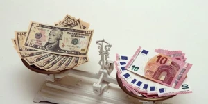 "1 avro 2 dollara bərabər ola bilər"