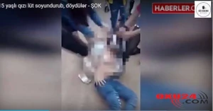 Oğlanla cinsi əlaqədə olan qızı lüt soyundurub, küçənin ortasında....+VİDEO