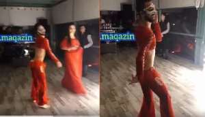 Azərbaycanda biabırçılıq! Oğlan göbəyi açıq oriental oynadı