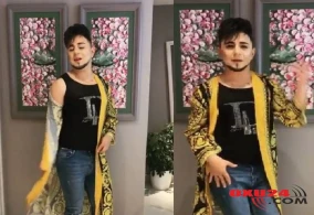 Bayram Nurlunun makiyajda,zərli xalatda erotik rəqs etdi