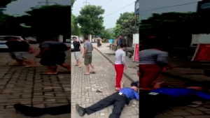 Əsəbiləşən vətəndaş dibçəyi polisin başına vurdu -Polis bayıldı