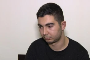 Bakıda yaşlı qadına kömək etmək adı ilə onu soydu