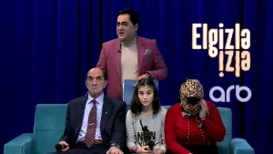 Elgizin verilişində maraqlı anlar: Kişi üçün  efirə gələn qadın dəsmalla üzünü bağladı (VİDEO)