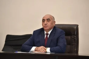 Azərbaycanda həbs olunan icra başçısının oğlu məhkəmə hakimidir - FOTO