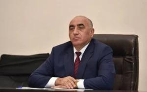 Həbs olunan başçının oğlu işdən çıxarılıb