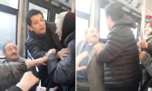 Avtobusda qadınla kişi əlbəyaxa oldu +VİDEO