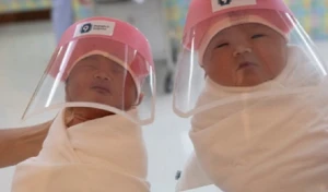 Taylandda yeni doğulan körpələrə qoruyucu maskalar taxıldı