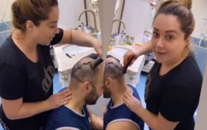 Xatirə İslam hamamda ərinin saçını kəsdi — VİDEO