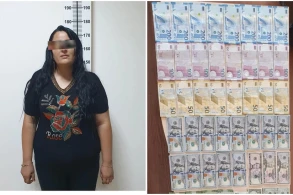 Kişi geyimində evdən 45 min manat oğurlayan qadın saxlanılıb