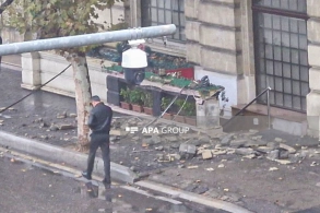 Qadının başına daş düşdü - FOTO