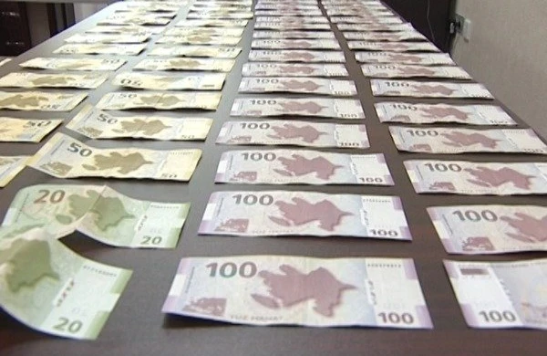 Lənkəran sakininin evindən saxta əskinaslar və narkotik götürüldü