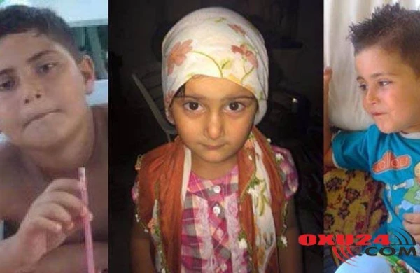 Ana 3 uşağının başını kəsdi