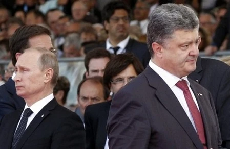 Putin Poroşenkonun zənginə cavab verməyib