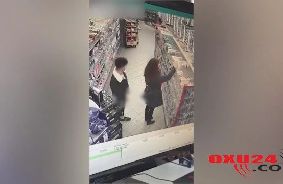 Marketdə biabırçılıq: Ərzaq alan qıza qarşı seksual hərəkətlər etdi, kameraya düşdü (VİDEO)