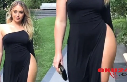 Dərin yarıqlı paltar geyinən modelin ombası göründü - FOTO