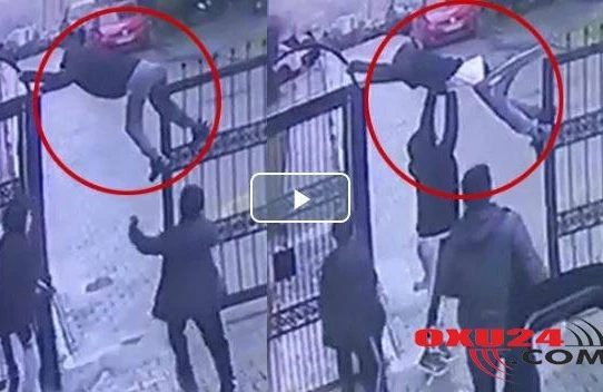 ŞOK anlar: Uşaq qapının başında ilişib qaldı, paltarı əynindən çıxdı