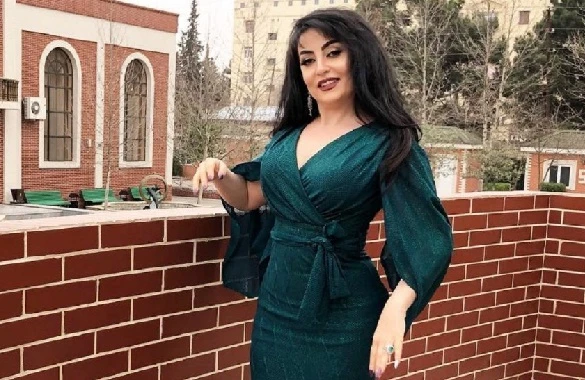 Afətdən Flora Kərimovaya növbəti təhqir:"Əxlaqsız,sidik içən,başını qırxan..."