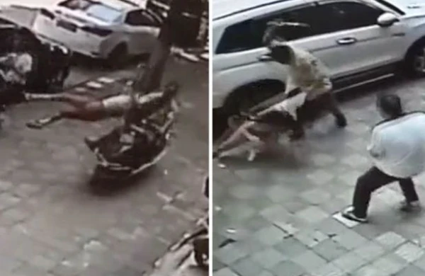 Dəhşətli hadisə kamerada: Qadını  maşınla vuran sürücü daha sonra onu döydü