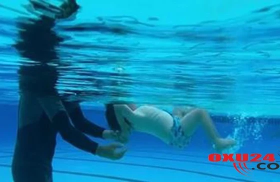 Dəhşətli intihar - Ana uşaqlarını özünə bağlayıb dənizdə boğdu - Foto