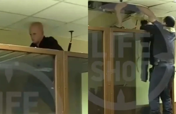 Məhkəmə zalından şok  görüntü: Qaçmaq istəyən məhbusun şalvarı çıxıb polisin əlində qaldı (VİDEO)