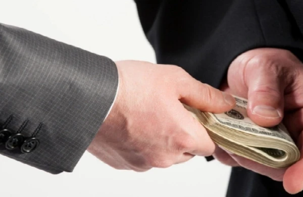 DTX məlumat  yaydı: Rüşvət alan məmur tutuldu