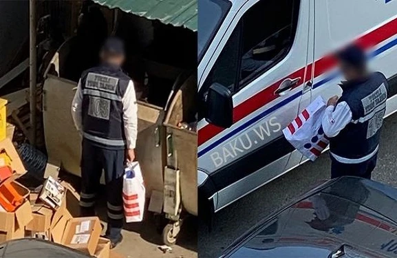 Bakıda təcili yardım maşınının sürücüsü zibil qutularını eşələyir -VİDEO