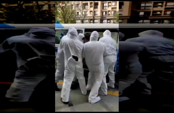 Koronoviruslu adamı zorla maşına salıb apardılar (VİDEO)