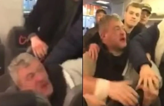 Təyyarənin göyərtəsində dava: Sərnişinin dişini qırdılar — VİDEO