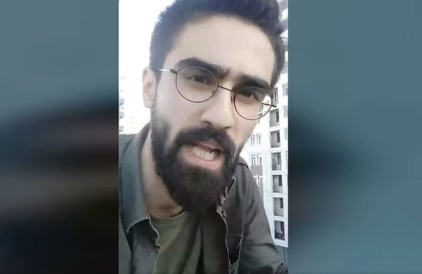 Etiraz aksiyası keçirən gənc fəal polis bölməsinə aparıldı