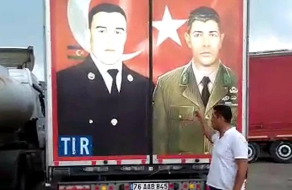 Gürcülər Mübarizin şəklini sökdürmək istədilər, türklər aman vermədi