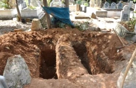Şəhidin məzarı açıldı, qəbirqazan qorxub qaçdı  - VİDEO