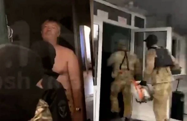 “Qara maskalılar” məşhur rusiyalı biznesmen və siyasətçini öz mənzilində həbs etdilər - VİDEO