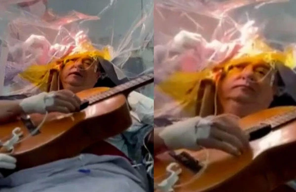 Beyin əməliyyatı keçirərkən 4 saat gitara çaldı - VİDEO