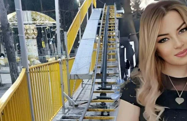 Gənc qadının öldüyü parkda qərənfillər düzüldü - FOTO