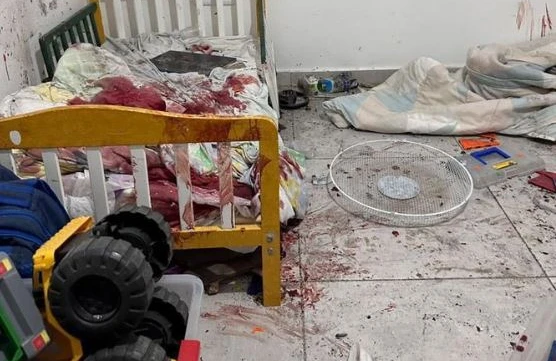 Tükürpədici görüntü yayıldı: Həmas uşaqların başını burada kəsib (18+)
